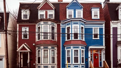 A row of houses each in a different architectural style.